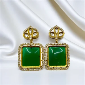 GREEN EAR STUDS ..