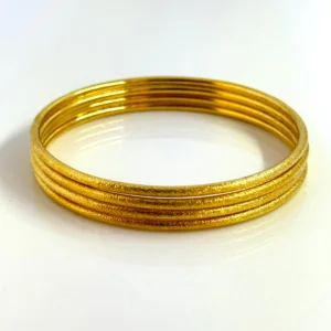 SHIMMERING GOLDEN BNAGLES