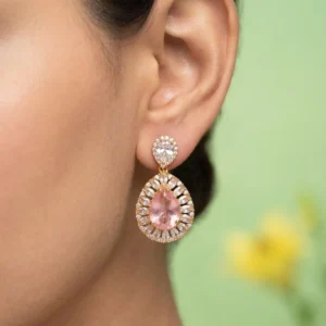 TEA PINK EAR STUDS .